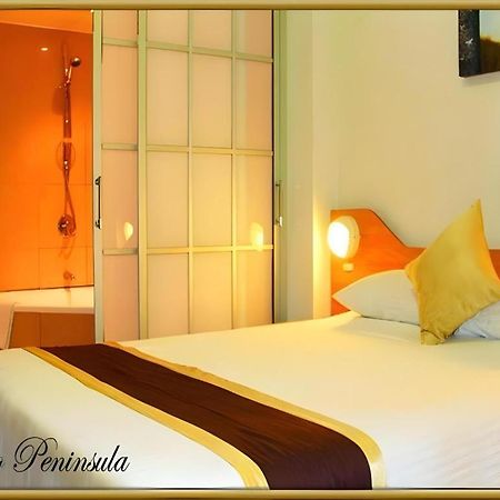 Peninsula International Hotel Сува Екстер'єр фото