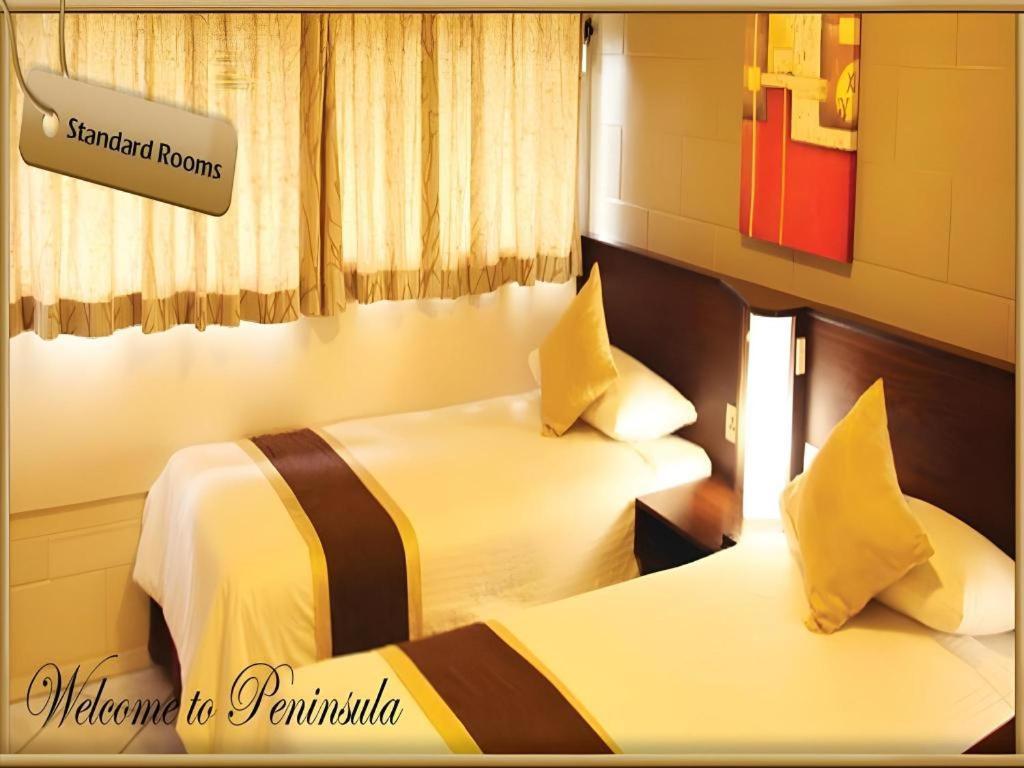 Peninsula International Hotel Сува Екстер'єр фото
