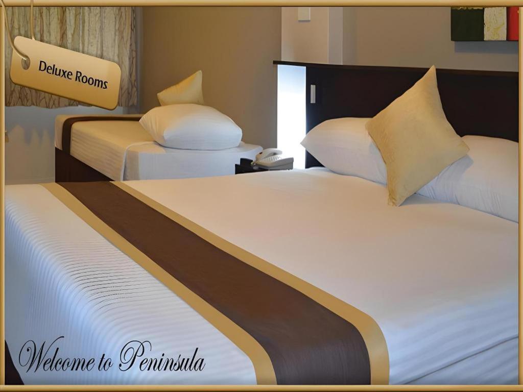 Peninsula International Hotel Сува Екстер'єр фото