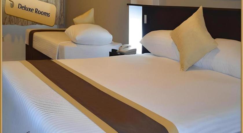 Peninsula International Hotel Сува Екстер'єр фото